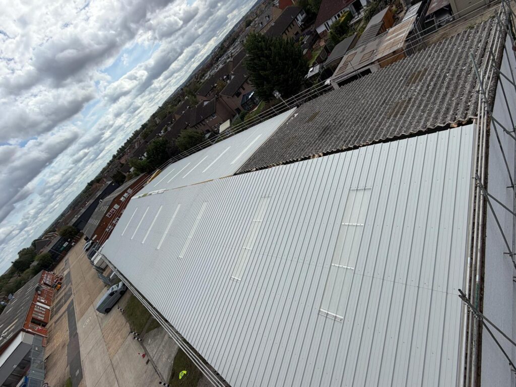 Henlow industrial roof during strip and re-sheet works Henlow industrial roof during strip and re-sheet works