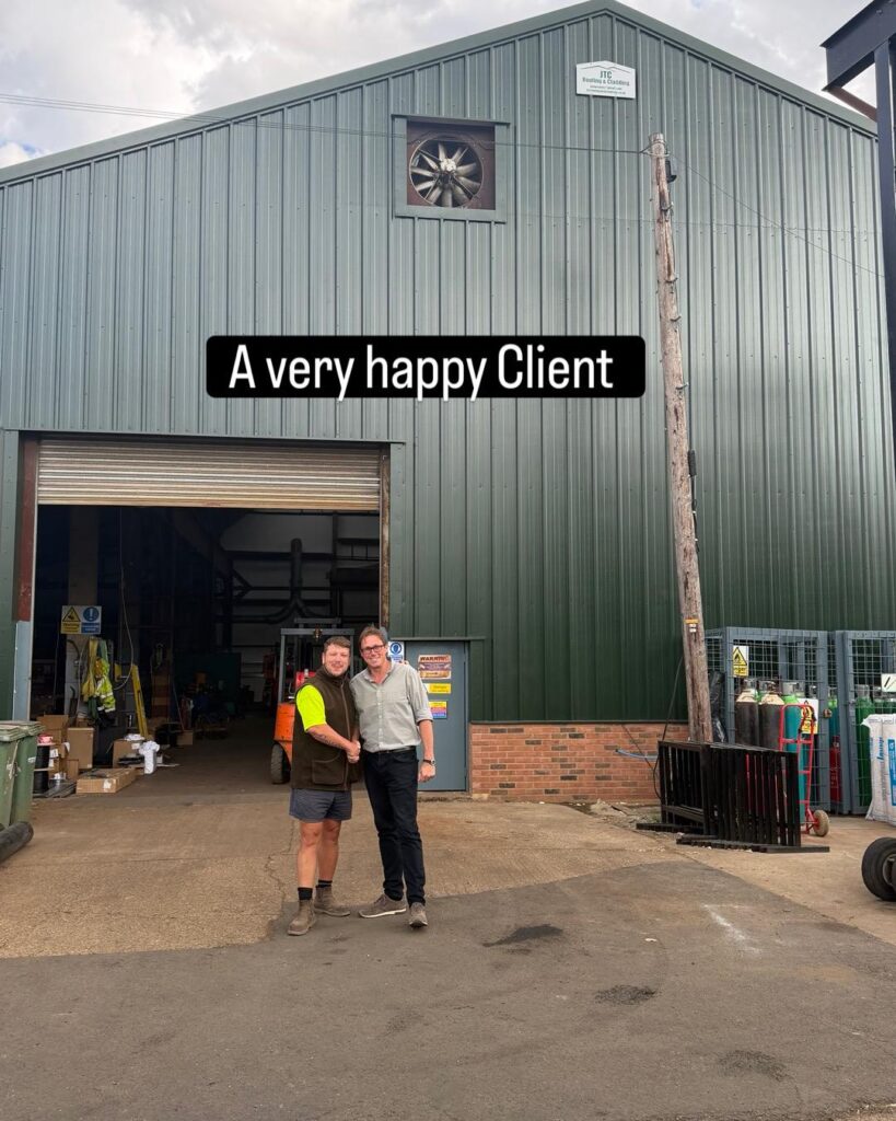 Happy customer after asbestos roof strip and re-sheet project
